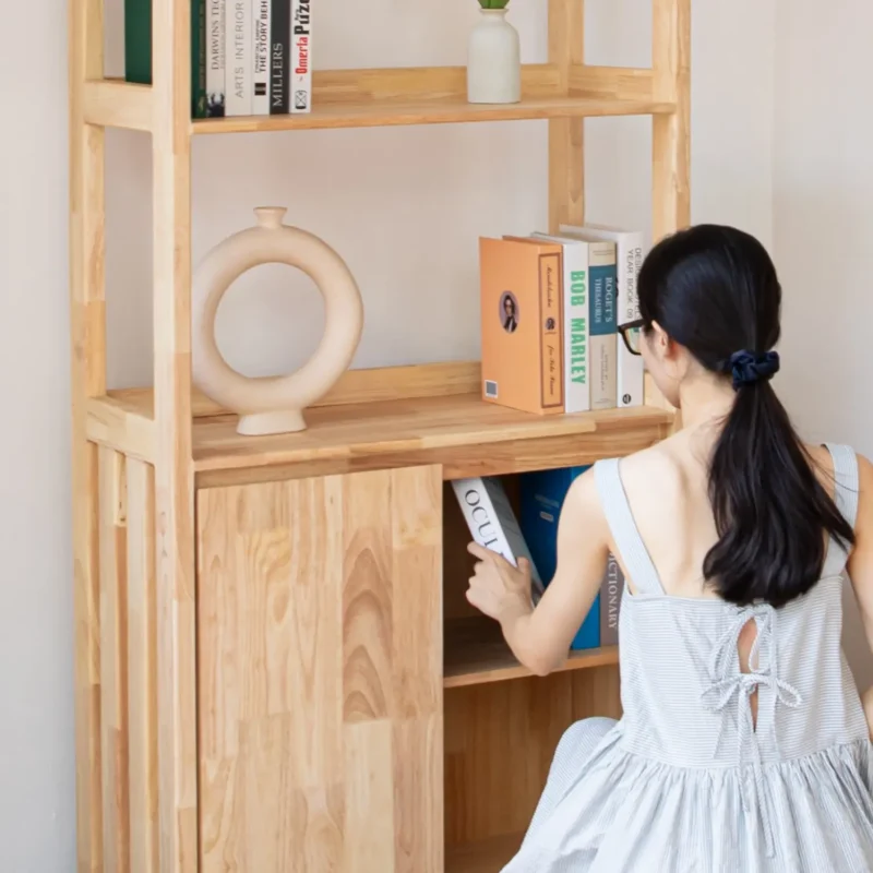 Solid wood bookshelf with open shelf and enclosed cabinet
